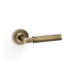 Alexander and Wilks Hurricane Reeded Lever on Round Rose - Antique Brass