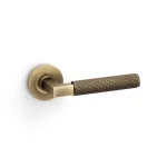 Alexander and Wilks Hurricane Knurled Lever on Round Rose - Antique Brass