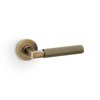 Alexander and Wilks Hurricane Reeded Lever on Round Rose - Antique Brass