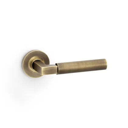 Alexander and Wilks Hurricane Reeded Lever on Round Rose - Antique Brass