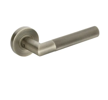 Tactil Lever on Round Rose - Antique Brass