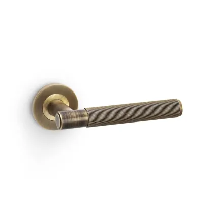 Alexander and Wilks Spitfire Reeded Lever on Round Rose - Antique Brass